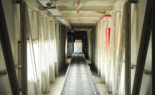 Convoyeurs automatiques dans l'entrepôt de Grup Baucells Alimentació